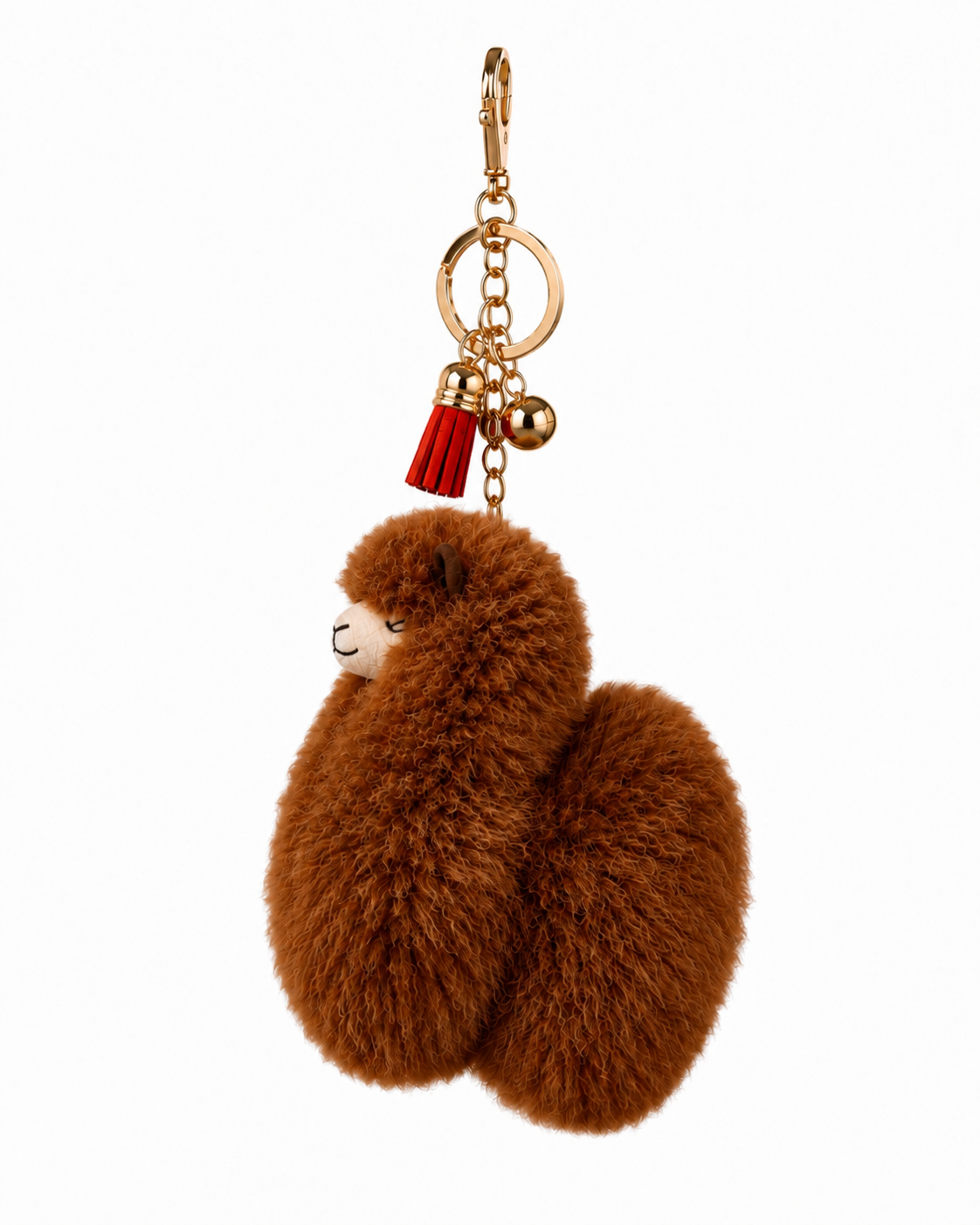 A brown fluffy alpaca-shaped  alpaca-fur keychain charm with a gold-tone clasp, key ring, chain, small gold bell, and a red tassel accent, shown on a plain white background.